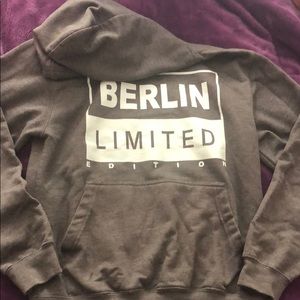 Grey “Berlin Limited” sweatshirt.